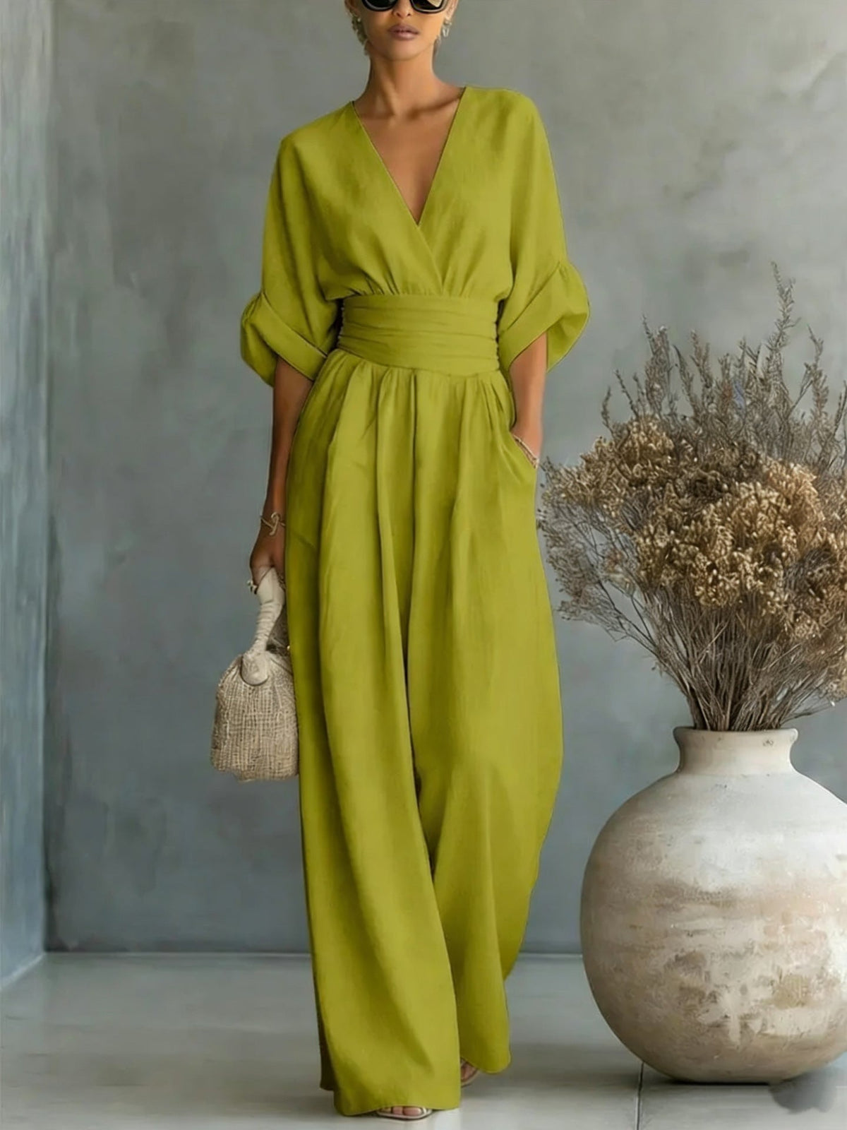 Vestido elegante con escote en V, espalda descubierta y mangas fluidas