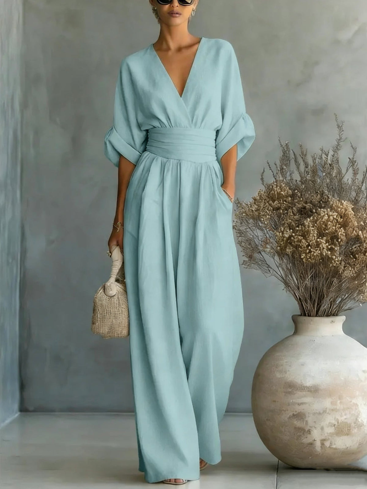 Vestido elegante con escote en V, espalda descubierta y mangas fluidas